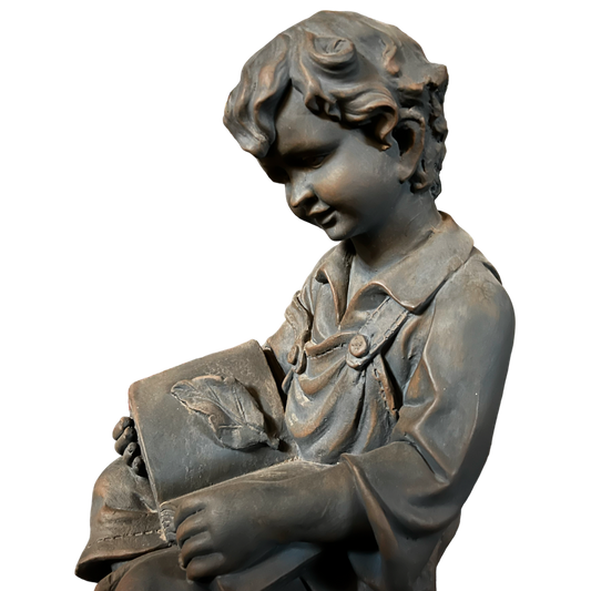 FIGURA NIÑO LEYENDO